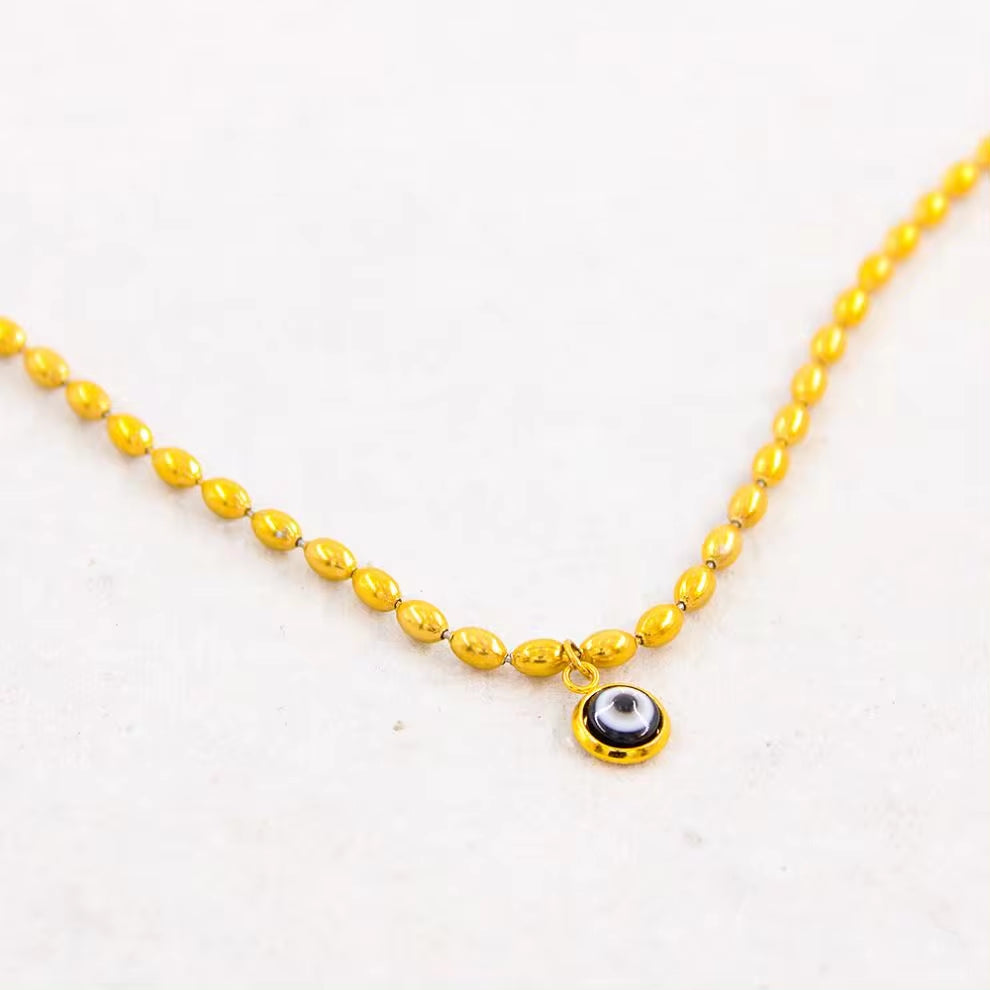 Wholesale Custom Stainless Steel Jewelry 18K PVD Gold Plated Oval Rice Bead Eyes Pendant Necklace for Women My Store