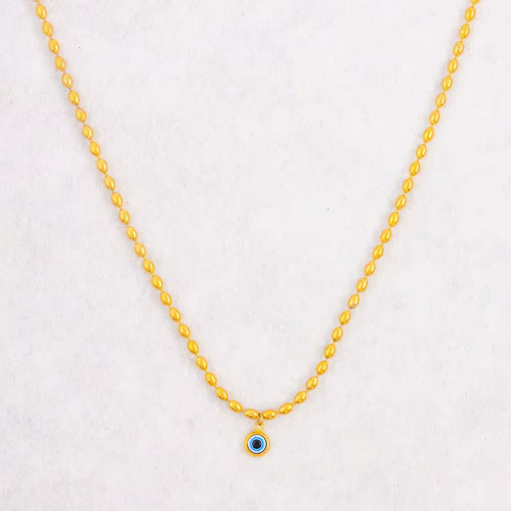 Wholesale Custom Stainless Steel Jewelry 18K PVD Gold Plated Oval Rice Bead Eyes Pendant Necklace for Women My Store